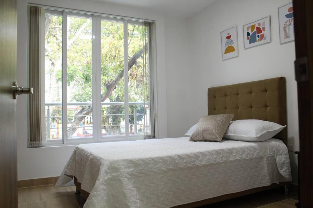 Apartamento con estacionamiento Buga Exterior foto